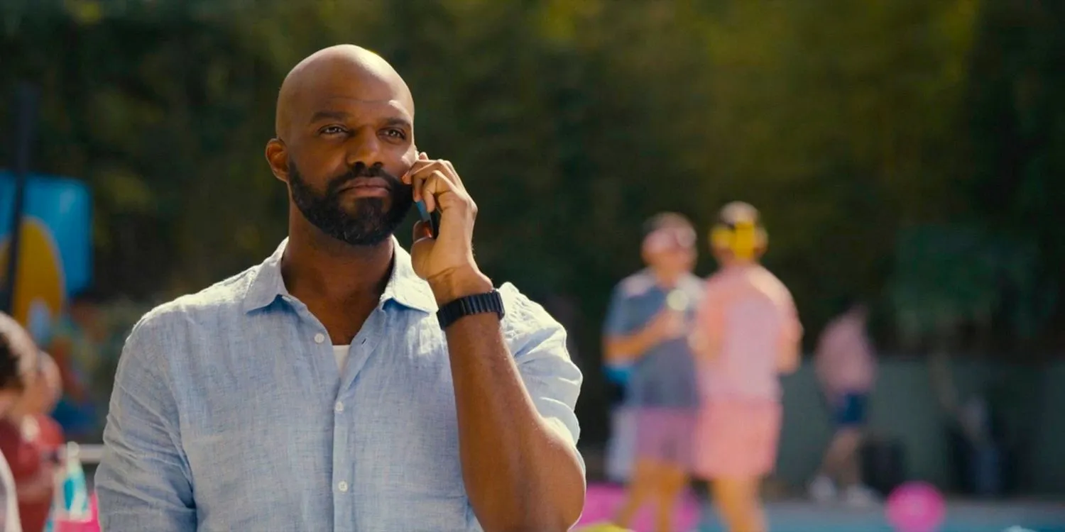 Marcus (Carl Clemons-Hopkins) looking disappointed while talking on the phone in Hacks season 3 episode 7, 8 Marcus (Carl Clemons-Hopkins) looking disappointed while talking on the phone in Hacks season 3 episode 7, 8