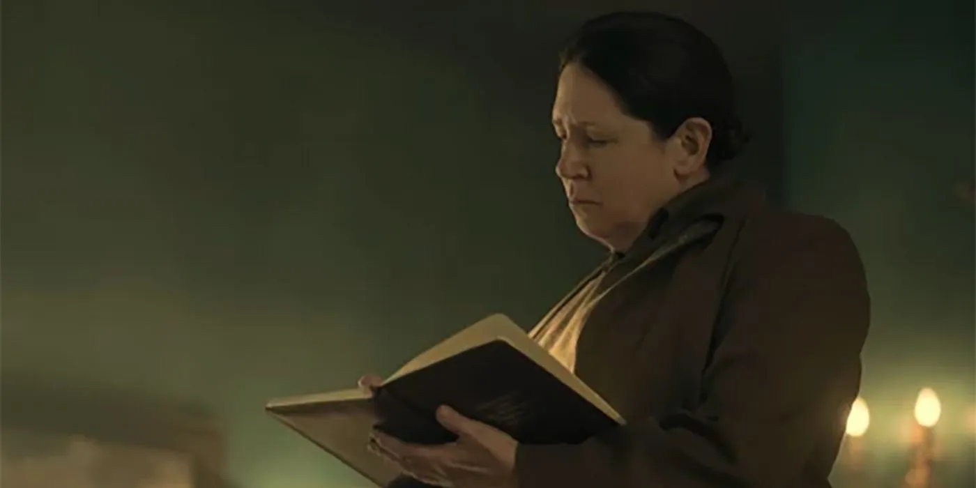 Aunt Lydia reading scripture Aunt Lydia reading scripture