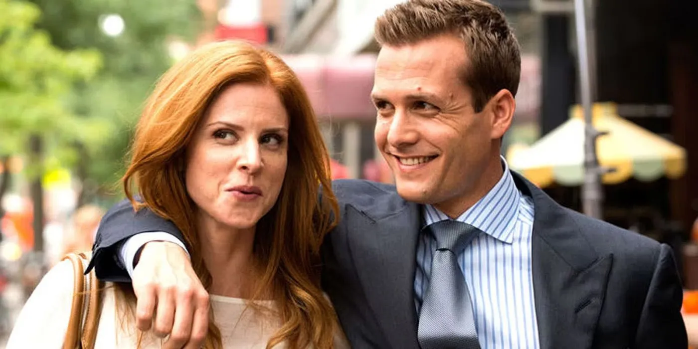 Harvey with his arm around Donna in Suits