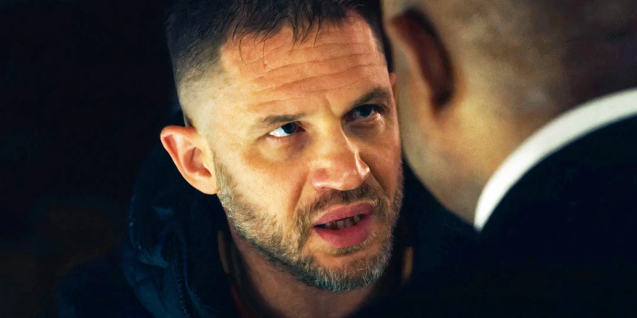 Tom Hardy as Walker staring intensely at Forest Whitaker in Havoc