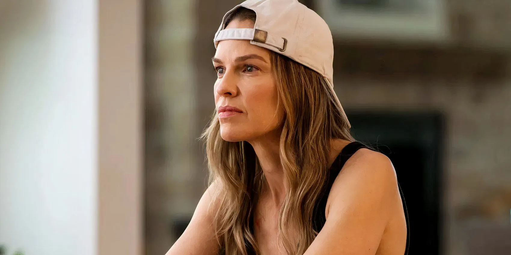 Melissa sitting at the table in Yellowjackets Season 3 Melissa sitting at the table in Yellowjackets Season 3