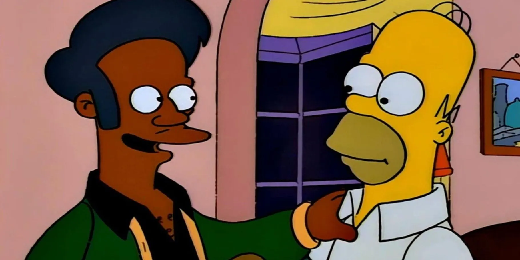 Homer and Apu with a warm interaction.