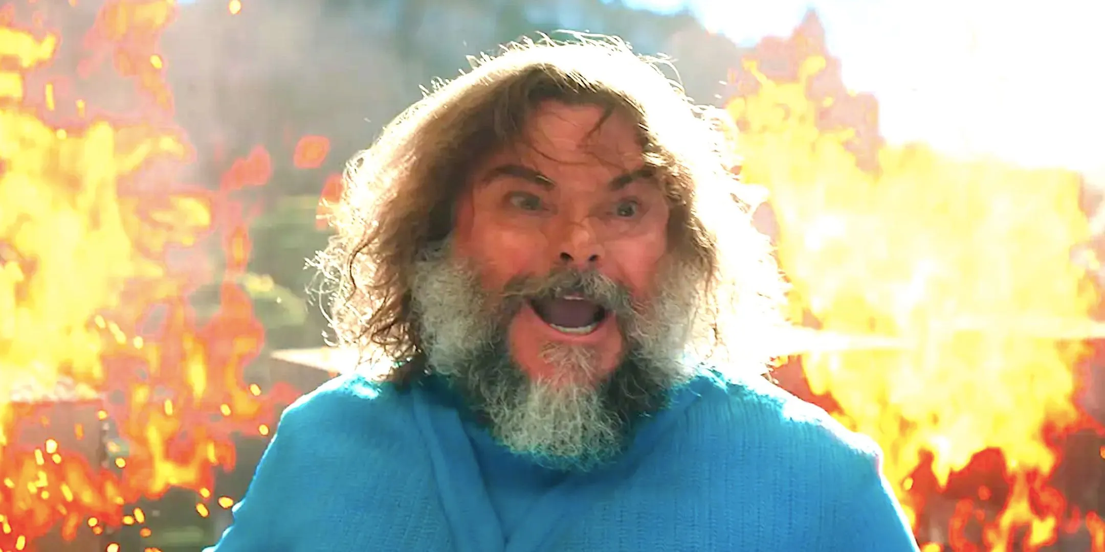 Jack Black's Steve runs screaming from an explosion in A Minecraft Movie 2025