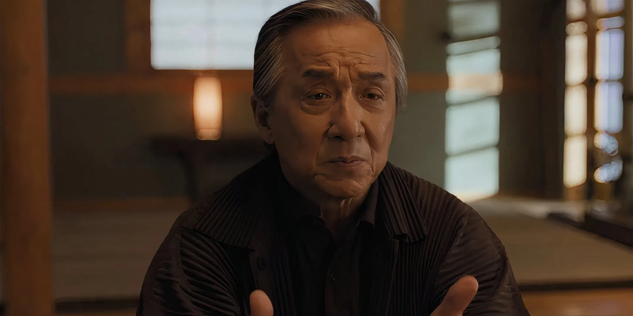 Mr. Han looking concerned in Karate Kid: Legends Mr. Han looking concerned in Karate Kid: Legends