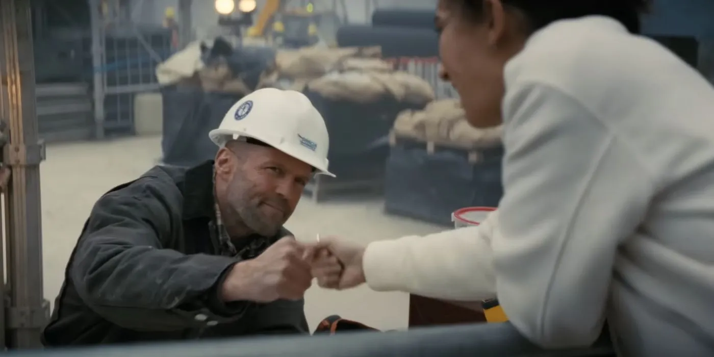 Jason Statham as Levon fistbumps Arianna Rivas as Jenny in A Working Man
