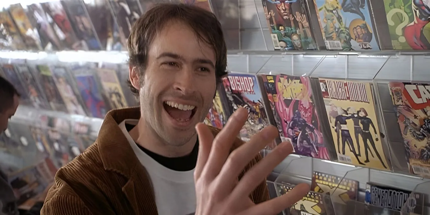 Jason Lees Brodie smiling at the comic book shop in Mallrats