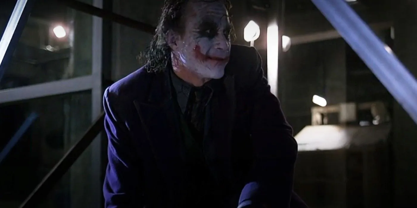Joker pins Batman Joker pins Batman