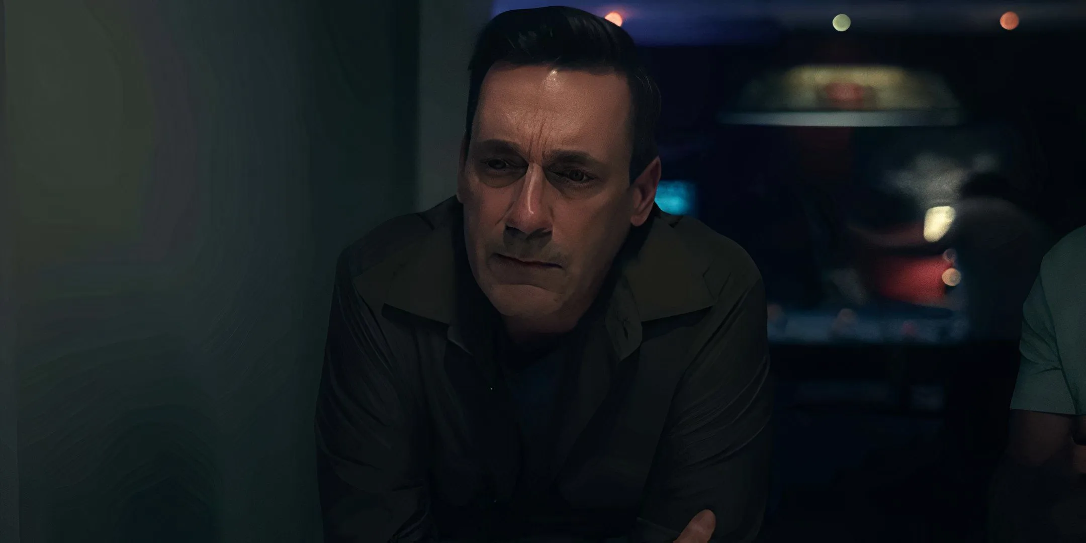 Jon Hamm deep in thought as Coop