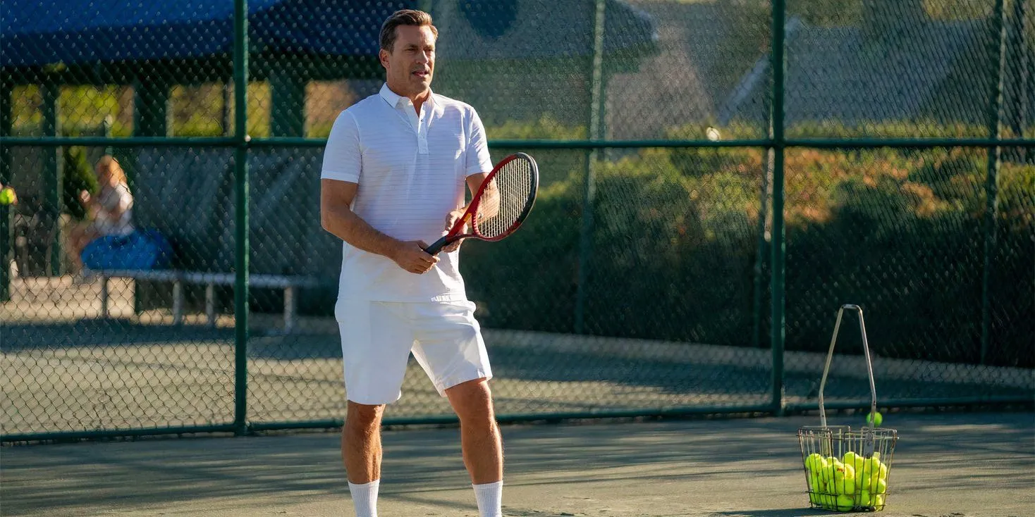 Jon Hamm playing tennis