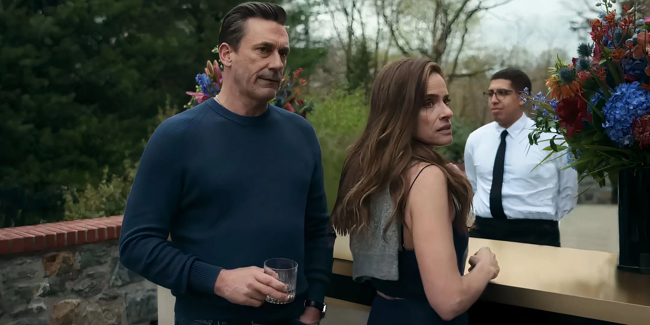 Jon Hamm's Coop and Amanda Peet's Mel looking upset in Your Friends and Neighbors