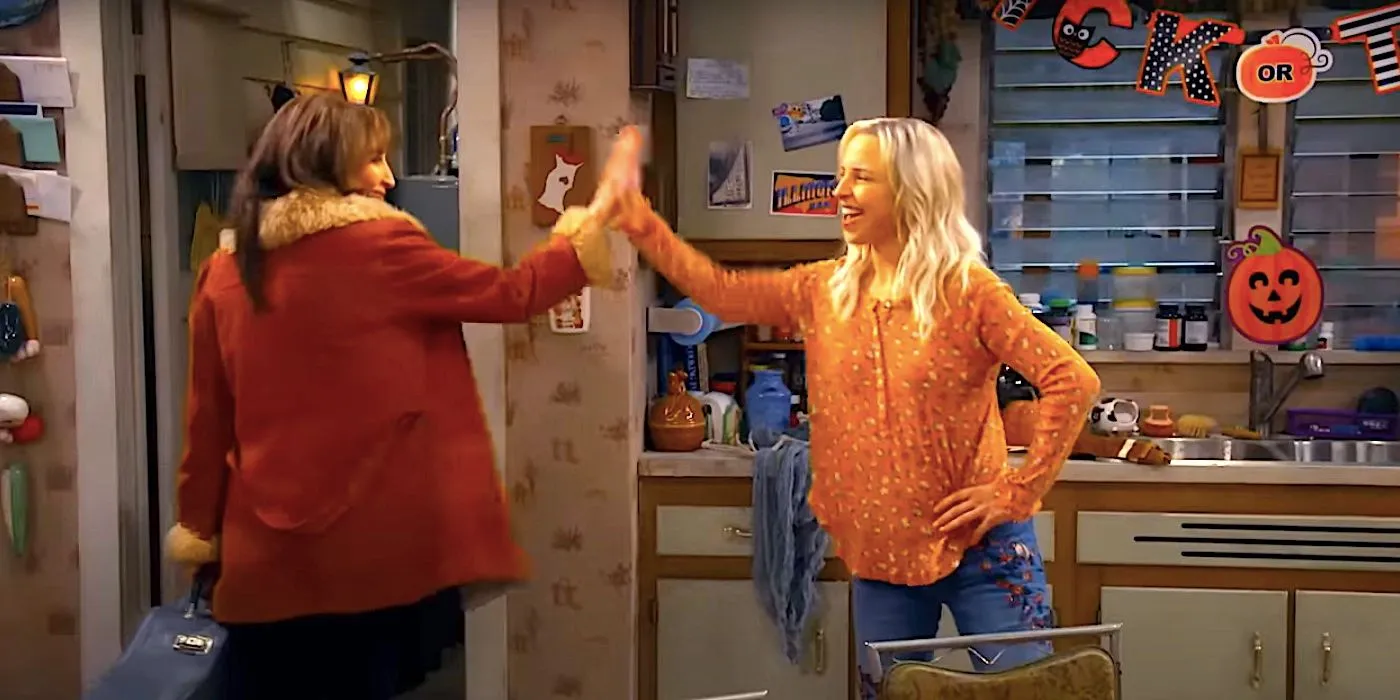 Louise and Becky high-five