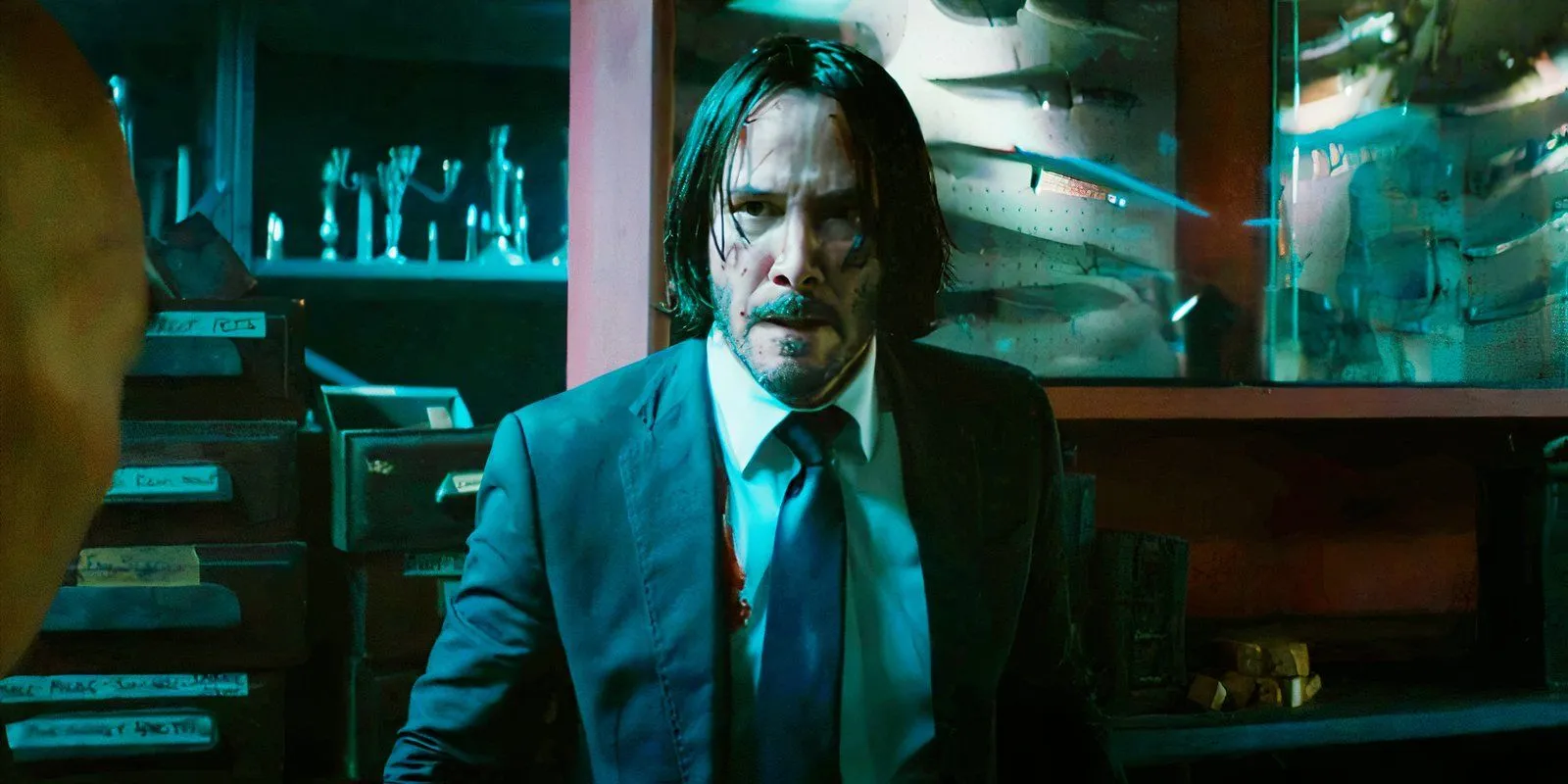 John Wick preparing for a fight John Wick preparing for a fight