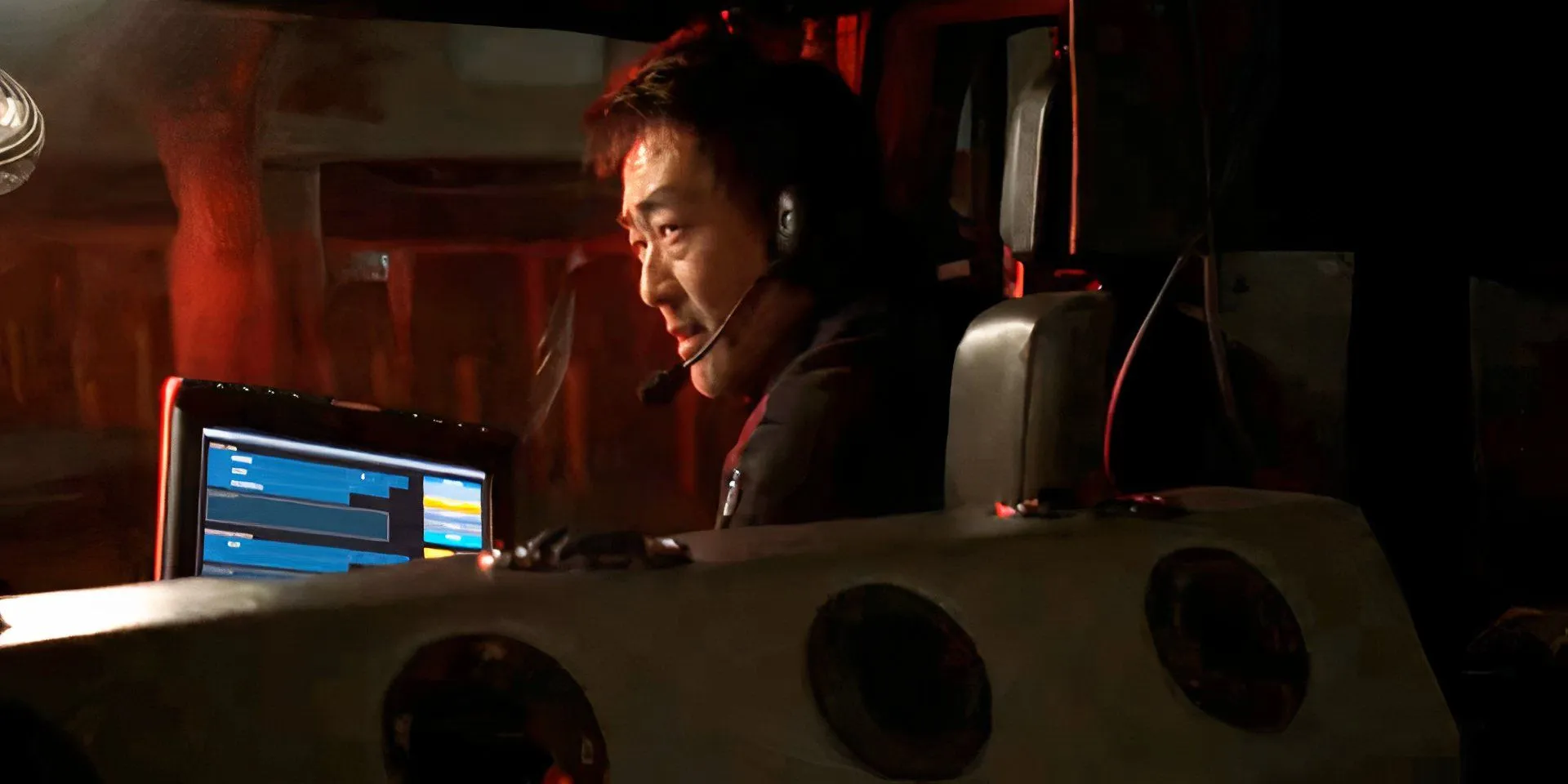 Kenneth Choi as Chimney Han surrounded by monitors in 9-1-1 season 2 episode 18 Kenneth Choi as Chimney Han surrounded by monitors in 9-1-1 season 2 episode 18