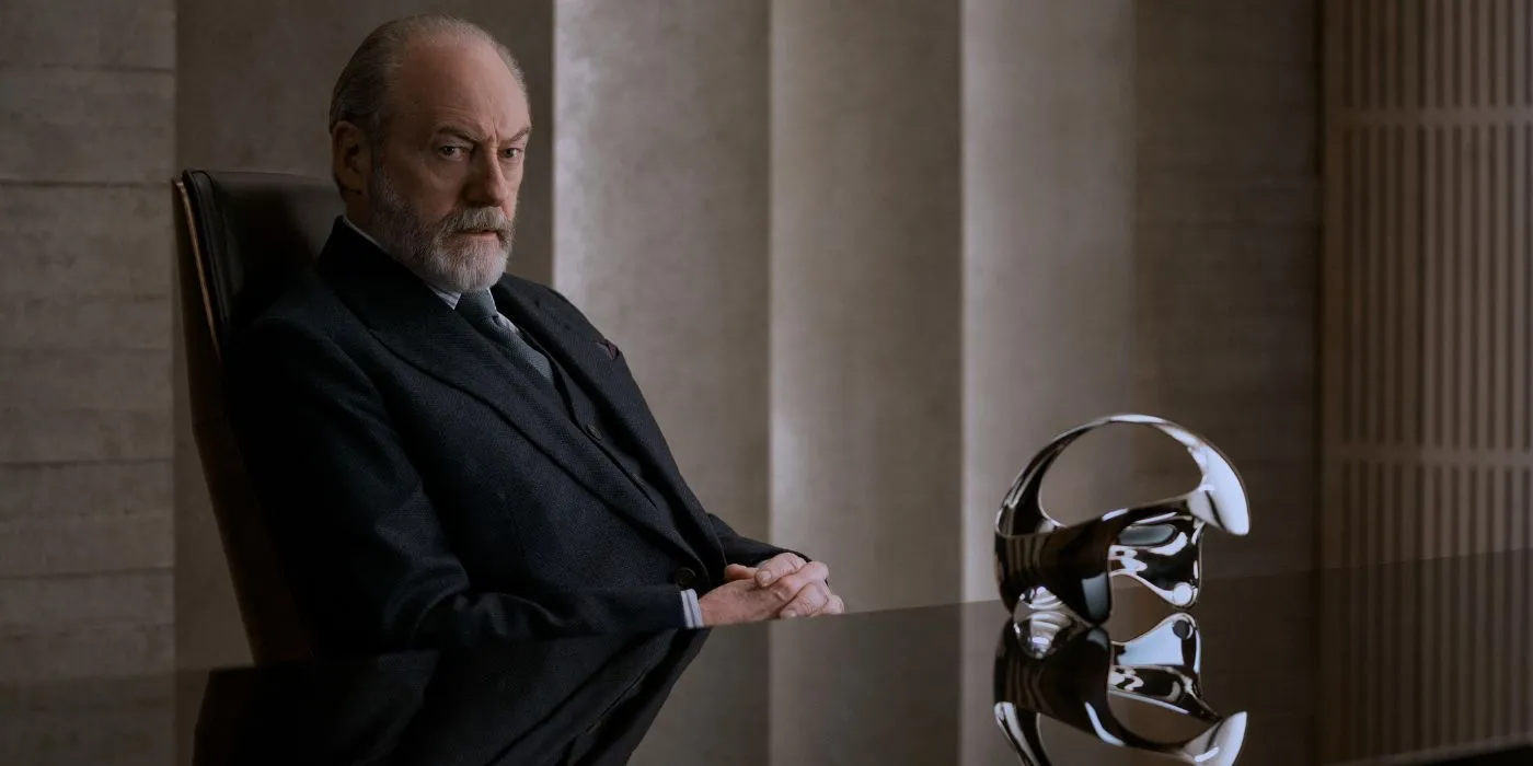Liam Cunningham as Thomas Wade sits serious in 3 Body Problem Liam Cunningham as Thomas Wade sits serious in 3 Body Problem