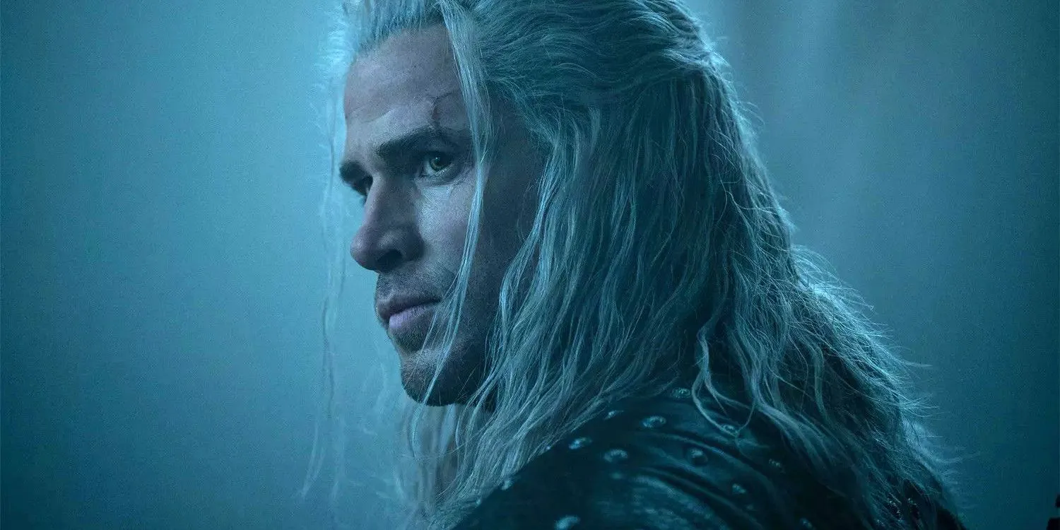 Liam Hemsworth as Geralt in The Witcher, sporting white hair and looking stoic Liam Hemsworth as Geralt in The Witcher, sporting white hair and looking stoic