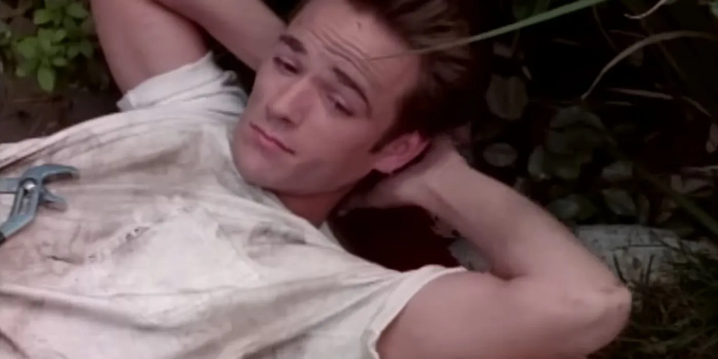 Luke Perry as Dylan McKay With His Hands Behind His Head in Beverly Hills 90210