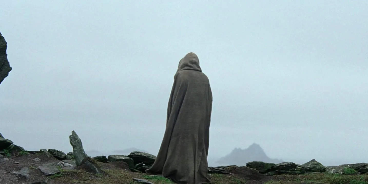 Luke Skywalker standing by something that looks like a grave in The Force Awakens