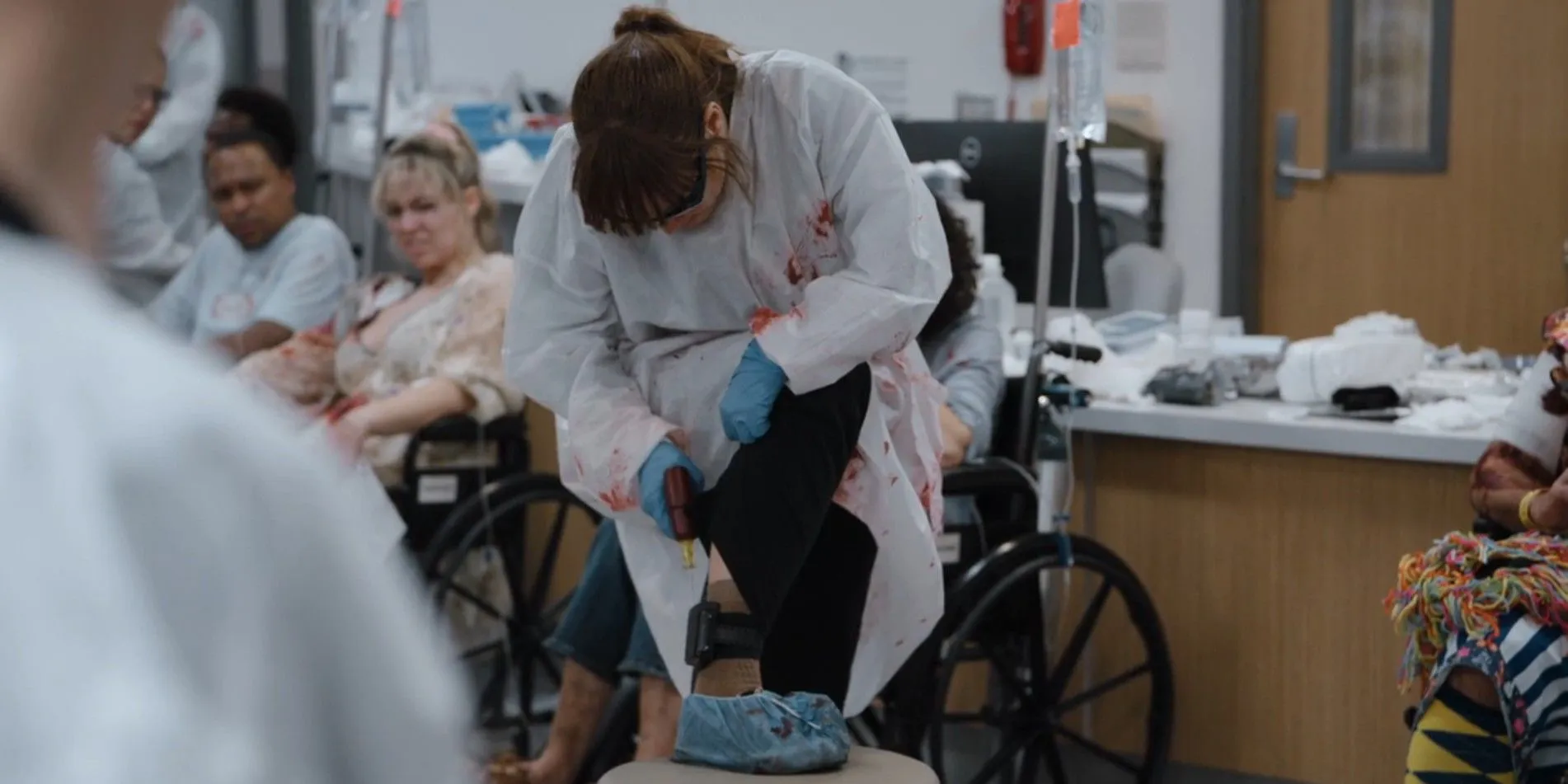Dr. McKay (Fiona Dourif) drilling a hole in her ankle monitor in The Pitt season 1, episode 13