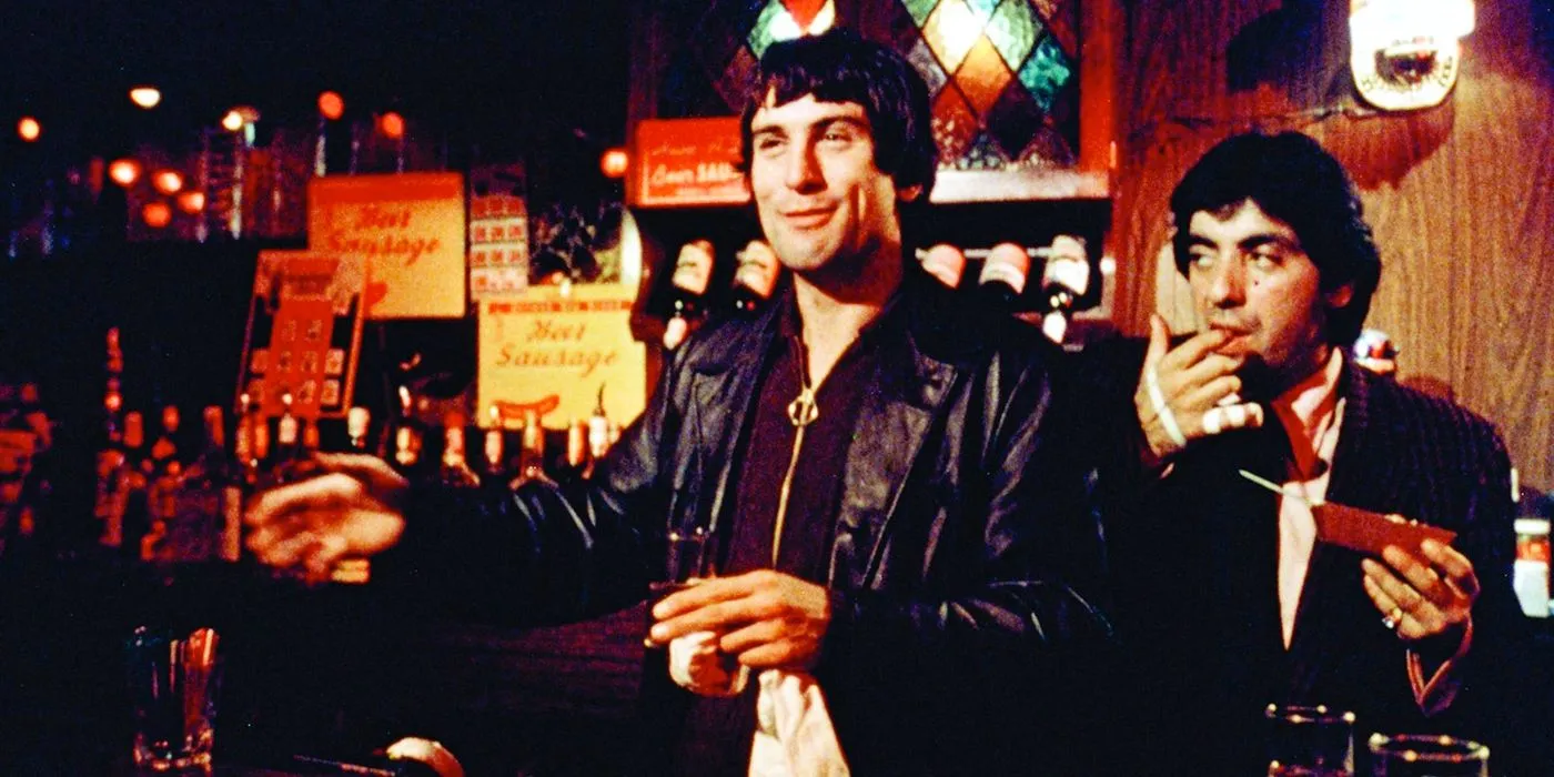 Robert De Niro grins in a bar in Mean Streets Robert De Niro grins in a bar in Mean Streets