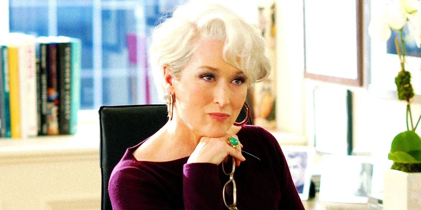 Meryl Streep as Miranda Priestly resting her chin on her hand in The Devil Wears Prada. Meryl Streep as Miranda Priestly resting her chin on her hand in The Devil Wears Prada.