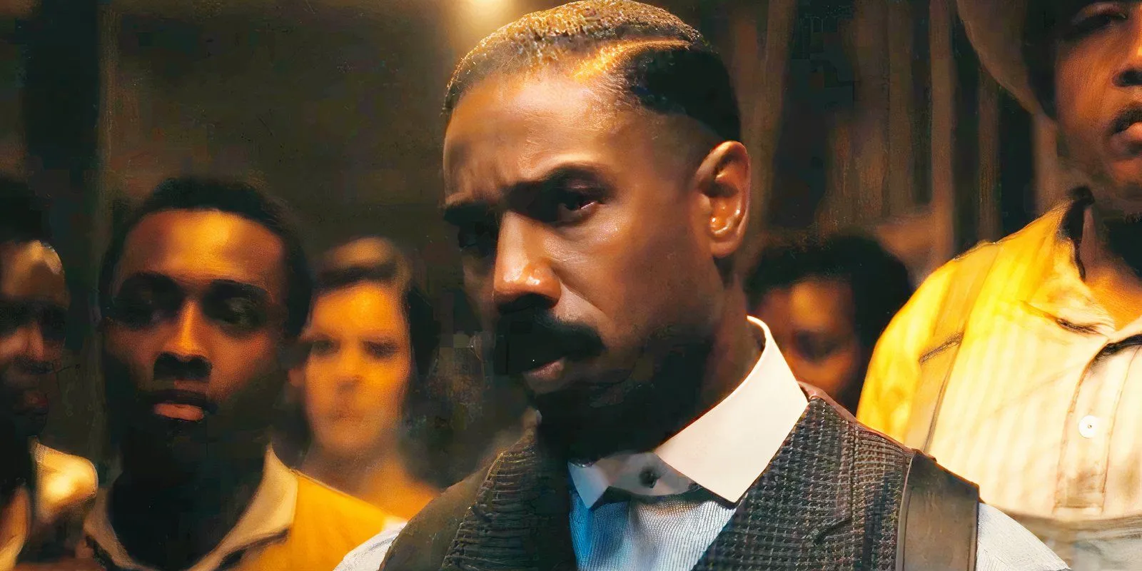 Michael B. Jordan blowing smoke in Sinners Michael B. Jordan blowing smoke in Sinners