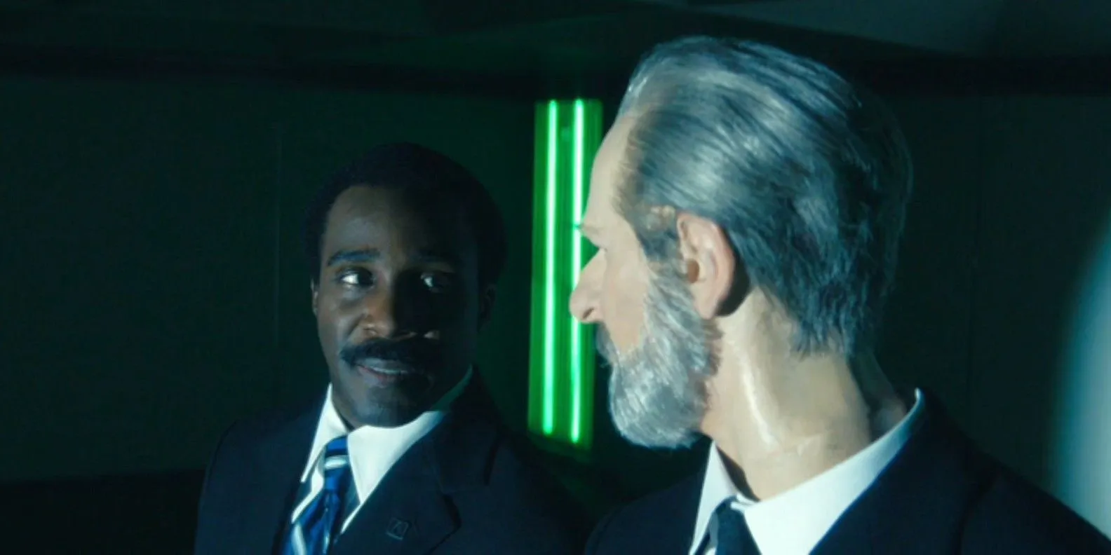 Seth Milchick (Tramell Tillman) looking disturbed at the wax statue of Kier Eagan in Severance season 2, episode 10