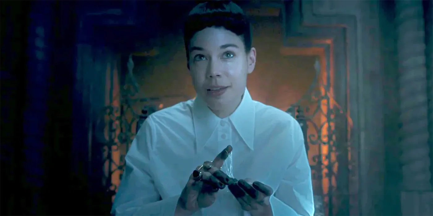 Moghedien smiling in Wheel of Time season 2 Moghedien smiling in Wheel of Time season 2