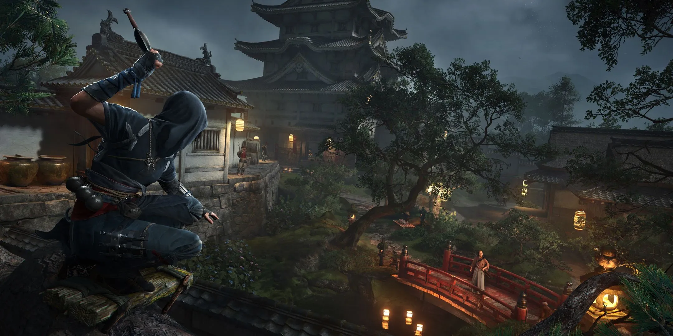 Naoe navigating a castle at night.