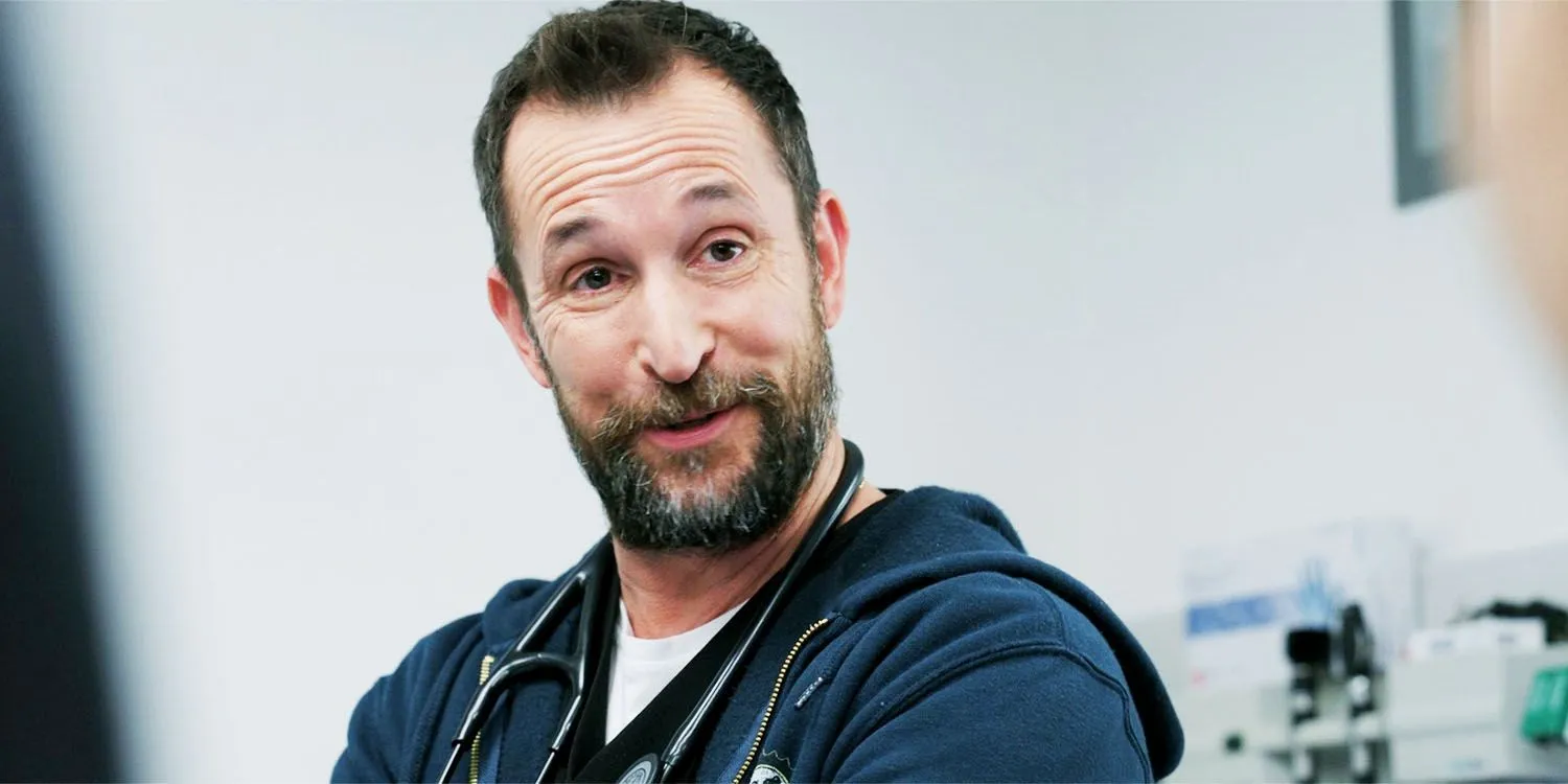 Noah Wyle smiling in The Pitt season 1, episode 3