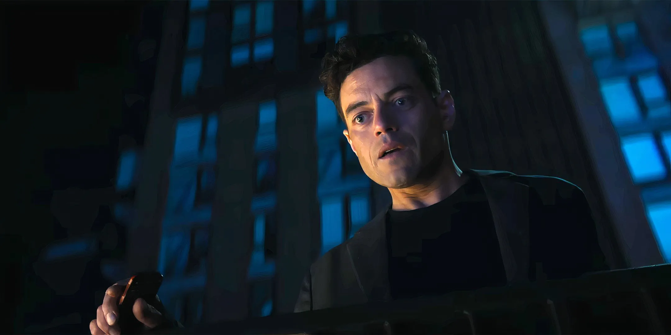 Rami Malek looking surprised in The Amateur Rami Malek looking surprised in The Amateur