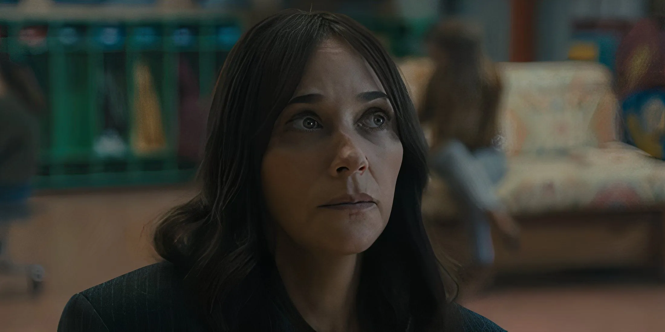 Rashida Jones as Amanda looking up in Black Mirror season 7, episode 1