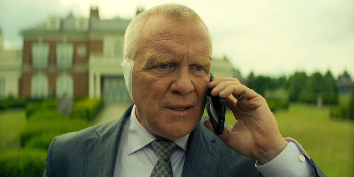 Zachary Beck (Anthony Michael Hall) looking terrified while receiving a phone call in Reacher Season 3 Ep 7