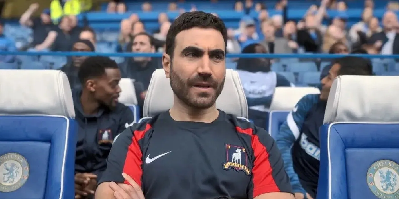 Roy Kent sitting on the sidelines in Ted Lasso