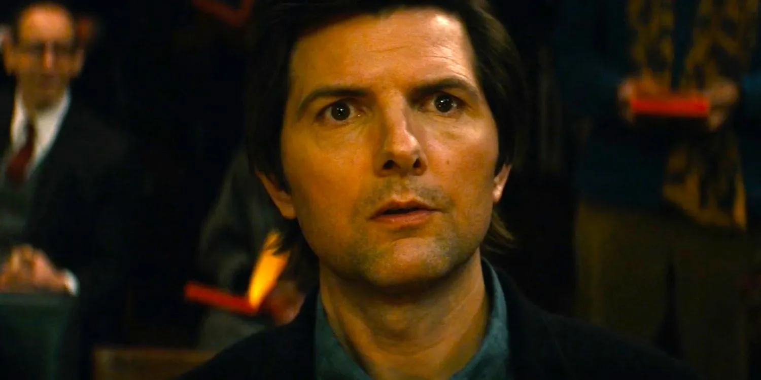 Adam Scott as Mark Scout listening to someone speak in Severance season 1 episode 9.