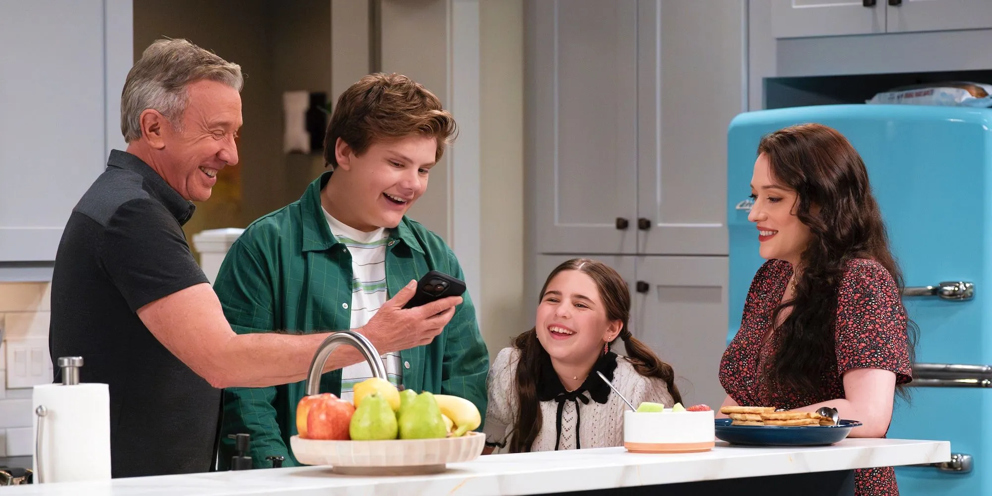 Matt (Tim Allen), Carter (Maxwell Simkins), Georgia (Barrett Margolis), and Riley (Kat Dennings) around the kitchen in Shifting Gears. Matt (Tim Allen), Carter (Maxwell Simkins), Georgia (Barrett Margolis), and Riley (Kat Dennings) around the kitchen in Shifting Gears.