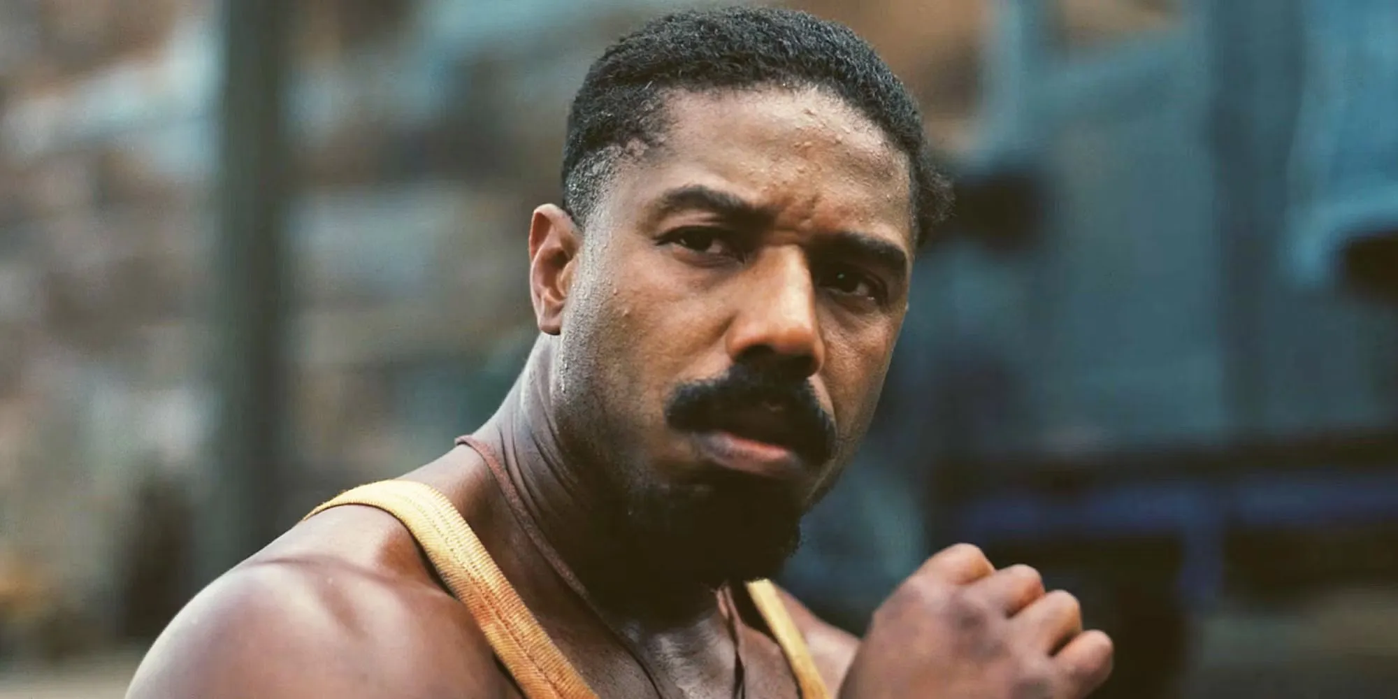 Michael B. Jordan looking thoughtful in Sinners Michael B. Jordan looking thoughtful in Sinners