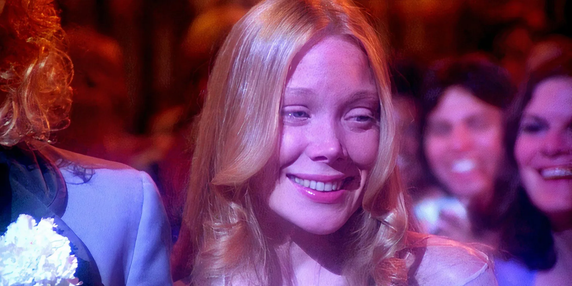 Sissy Spacek as Carrie smiling while going to prom Sissy Spacek as Carrie smiling while going to prom