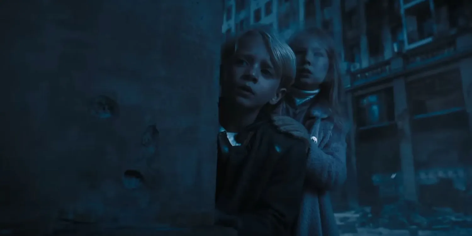 Snow and Tigris as children during the war in The Hunger Games: The Ballad of Songbirds and Snakes Snow and Tigris as children during the war in The Hunger Games: The Ballad of Songbirds and Snakes