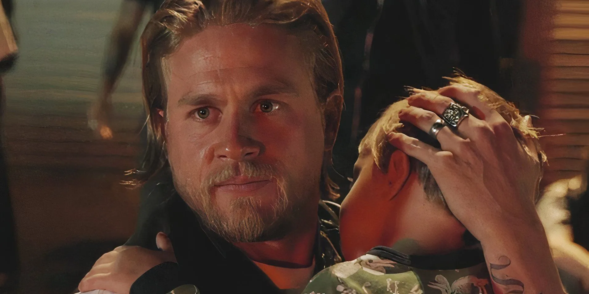 Sons of Anarchy Jax holding Abel