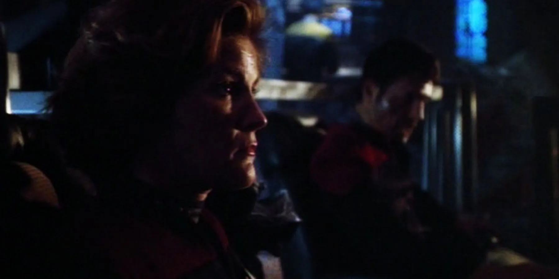 Janeway and Chakotay on the devastated bridge of the USS Voyager during a confrontation with the Kremin in Janeway and Chakotay on the devastated bridge of the USS Voyager during a confrontation with the Kremin in