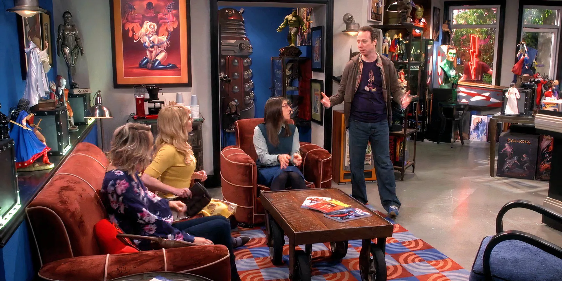Stuart converses with others in The Big Bang Theory