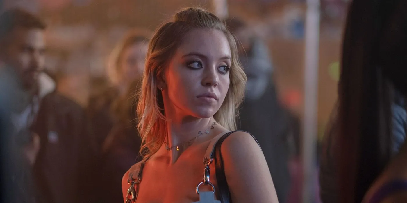 Sydney Sweeney as Cassie looking over her shoulder in Euphoria.