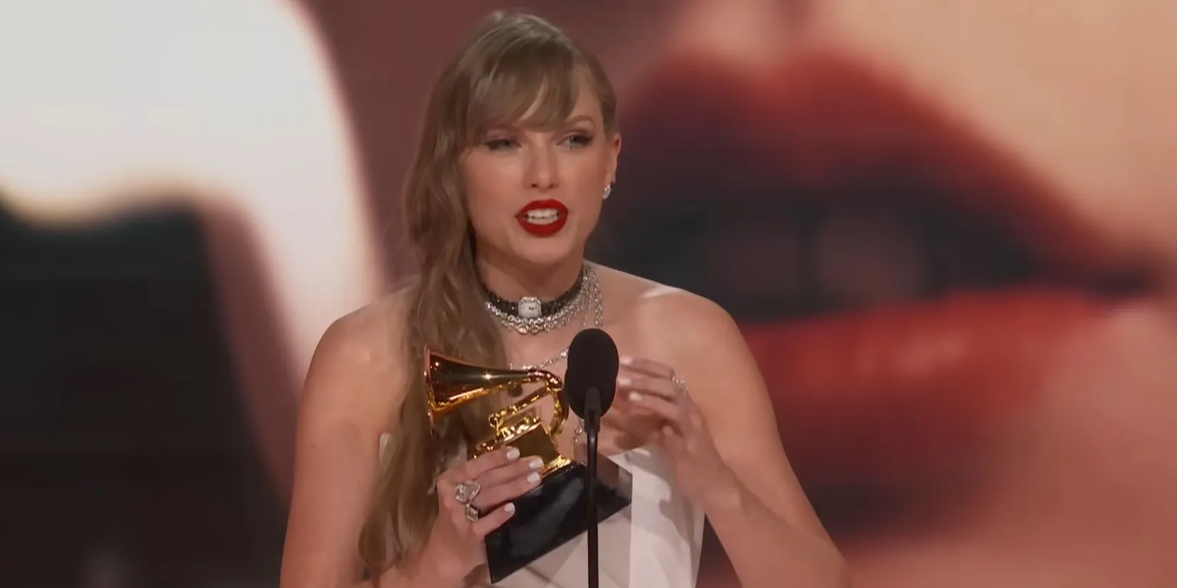 Taylor Swift accepting her award for Album of the Year for Midnights at the 2024 Grammys. Taylor Swift accepting her award for Album of the Year for Midnights at the 2024 Grammys.