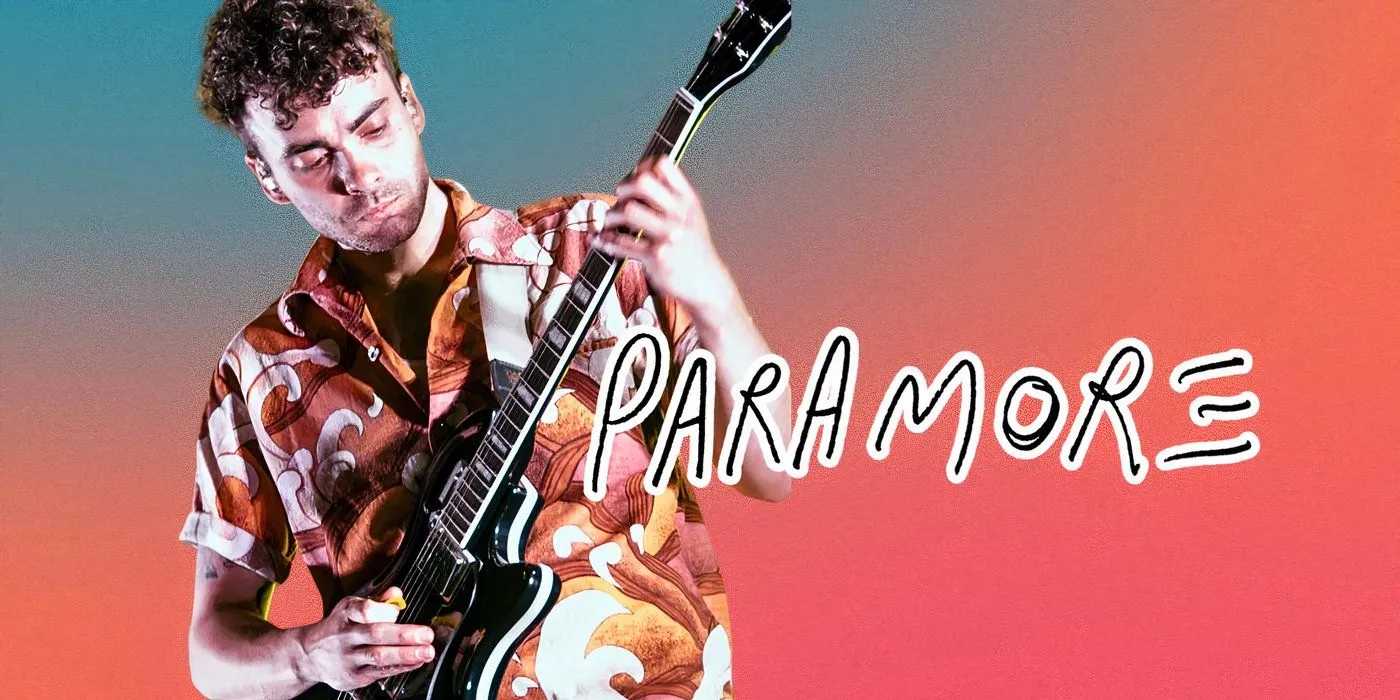 Guitarist Taylor York alongside the Paramore band logo