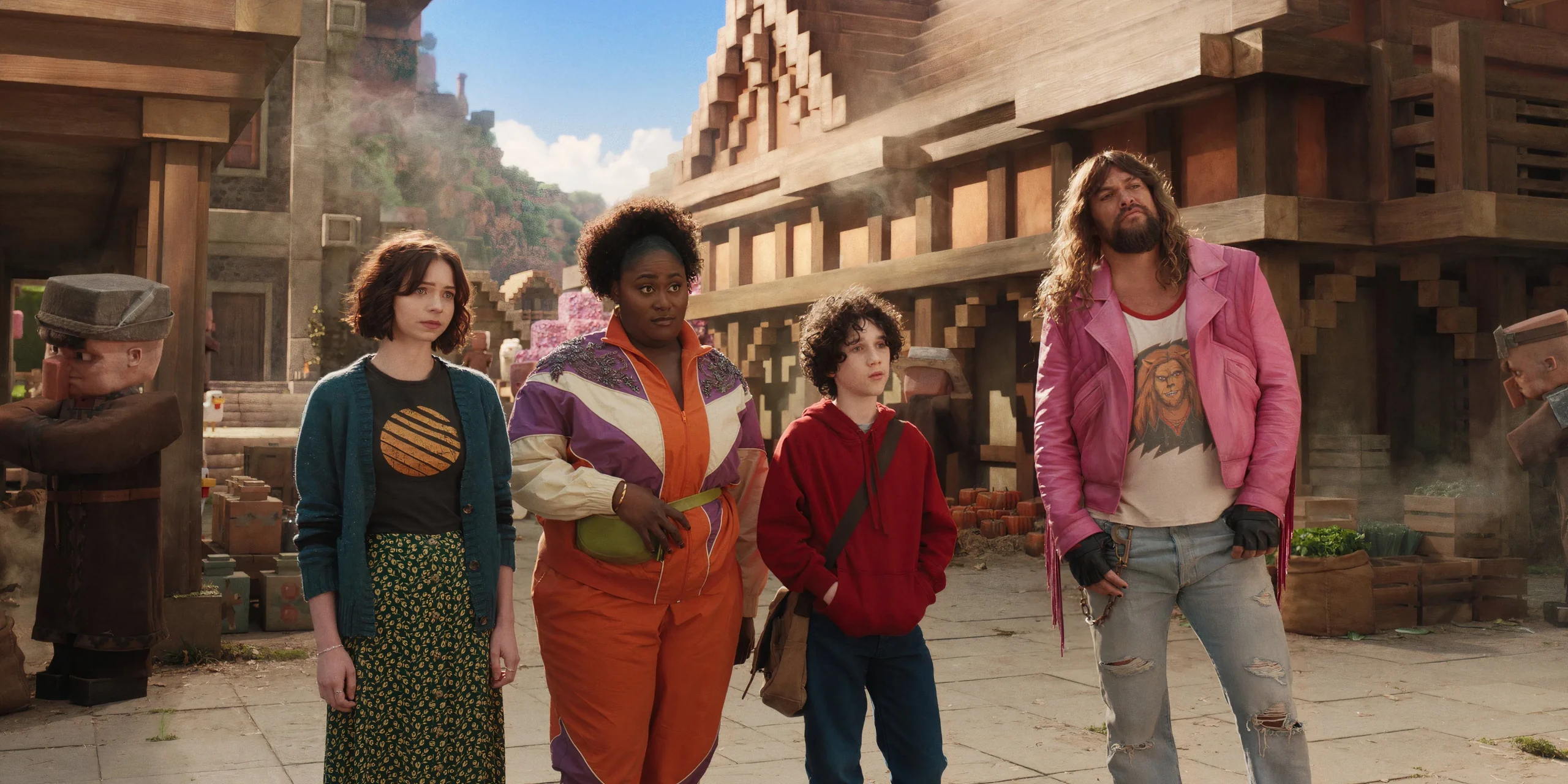 Cast of Minecraft Movie in a village