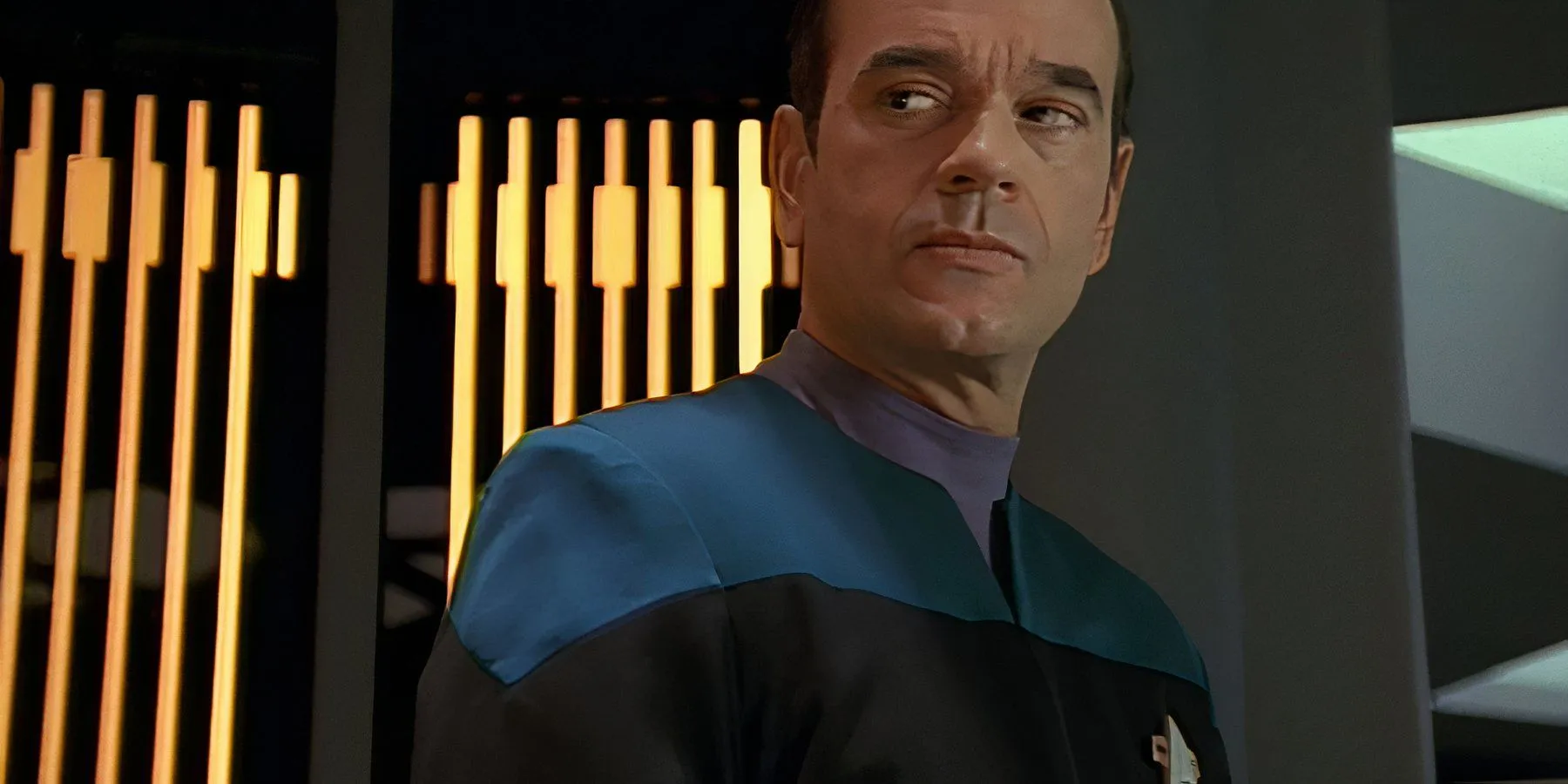 The Doctor (Robert Picardo) gives a skeptical look at a request to sing in Star Trek Voyager Phage