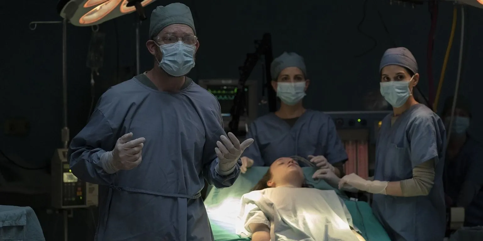The Firefly surgeon operating on Ellie in The Last of Us The Firefly surgeon operating on Ellie in The Last of Us