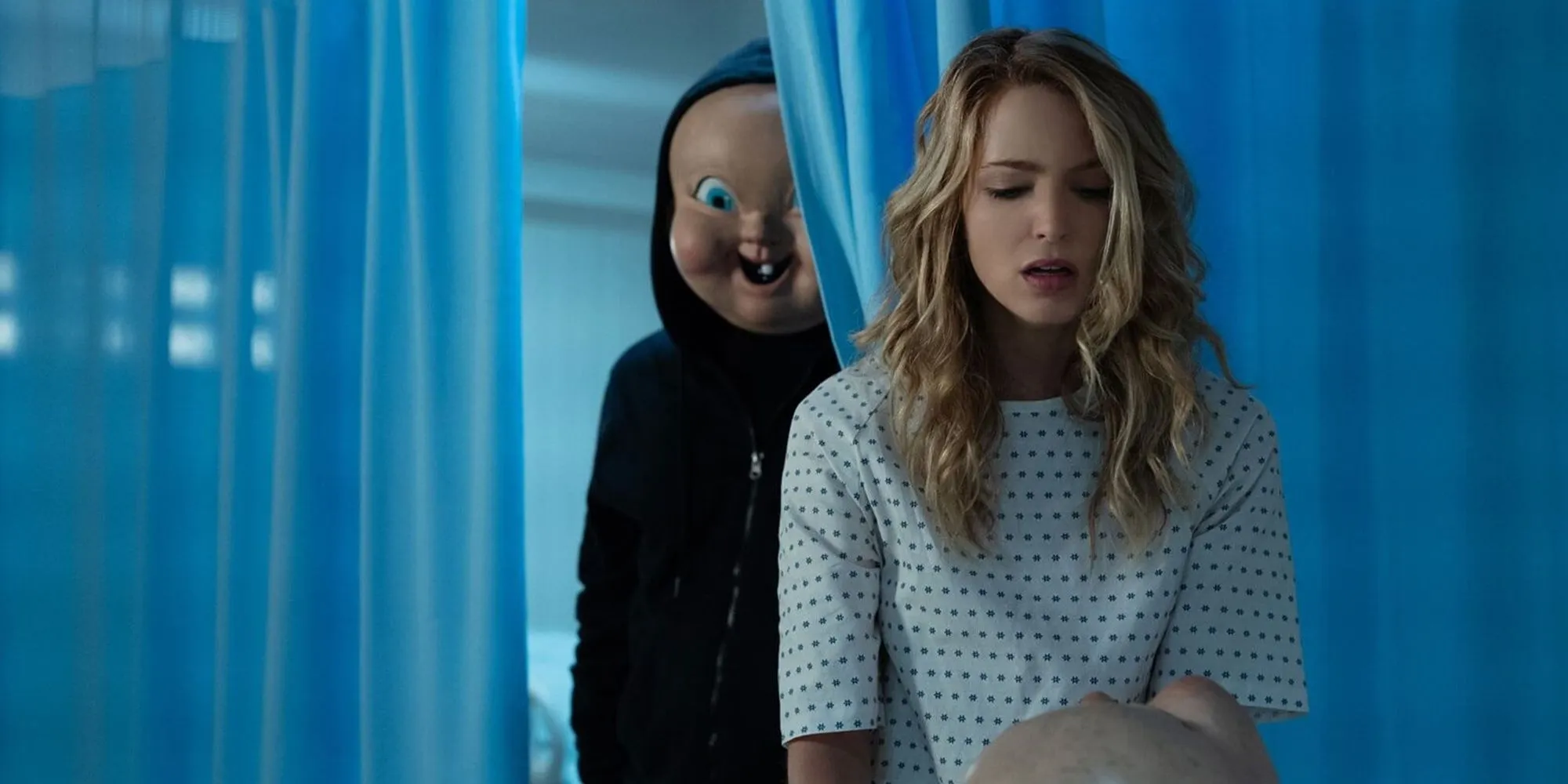 The killer sneaks up on Tree in Happy Death Day 2U The killer sneaks up on Tree in Happy Death Day 2U