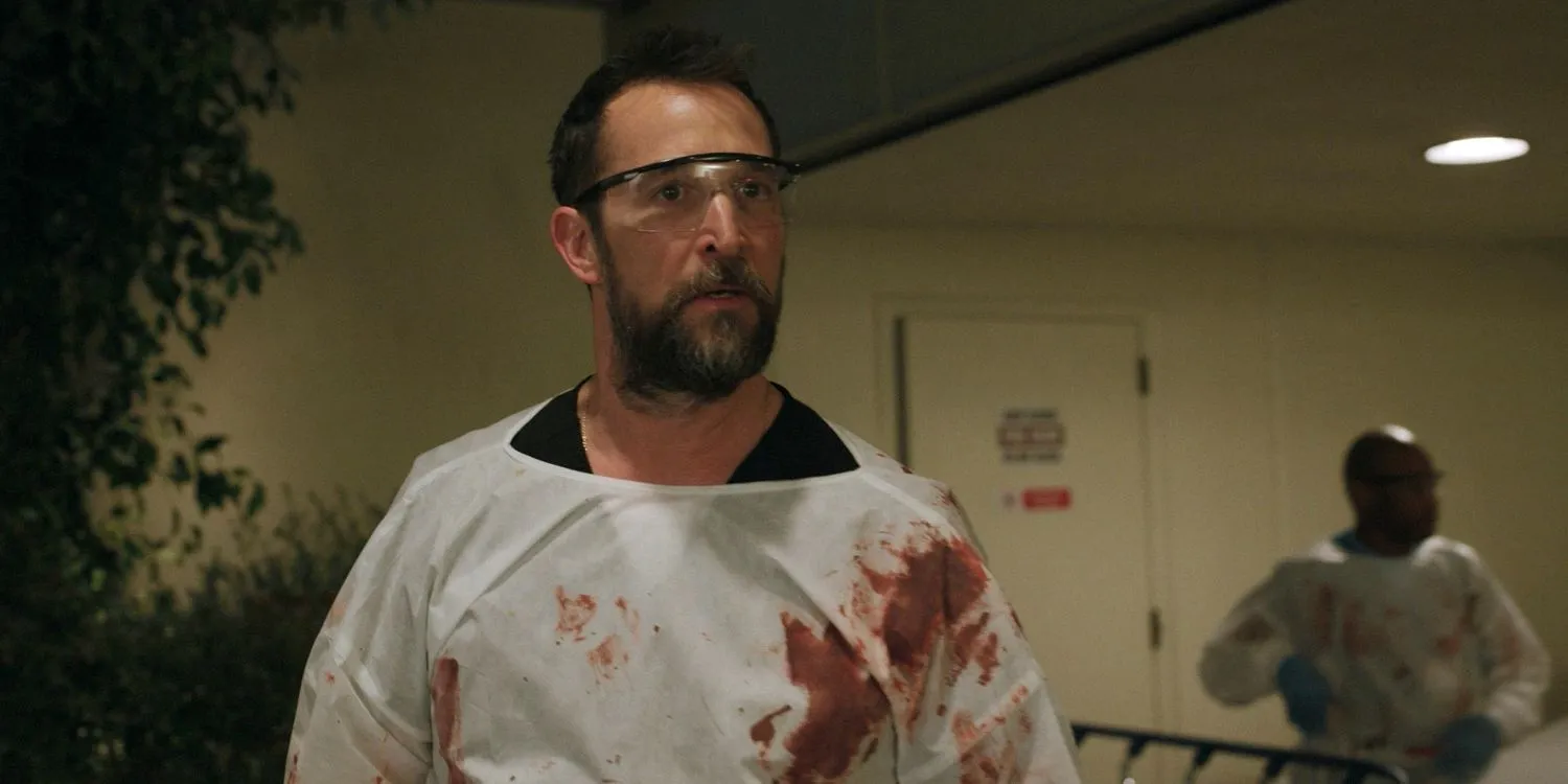 Dr. Robi (Noah Wyle) covered in blood, looking tense in The Pitt Season 1 Ep 13 Dr. Robi (Noah Wyle) covered in blood, looking tense in The Pitt Season 1 Ep 13
