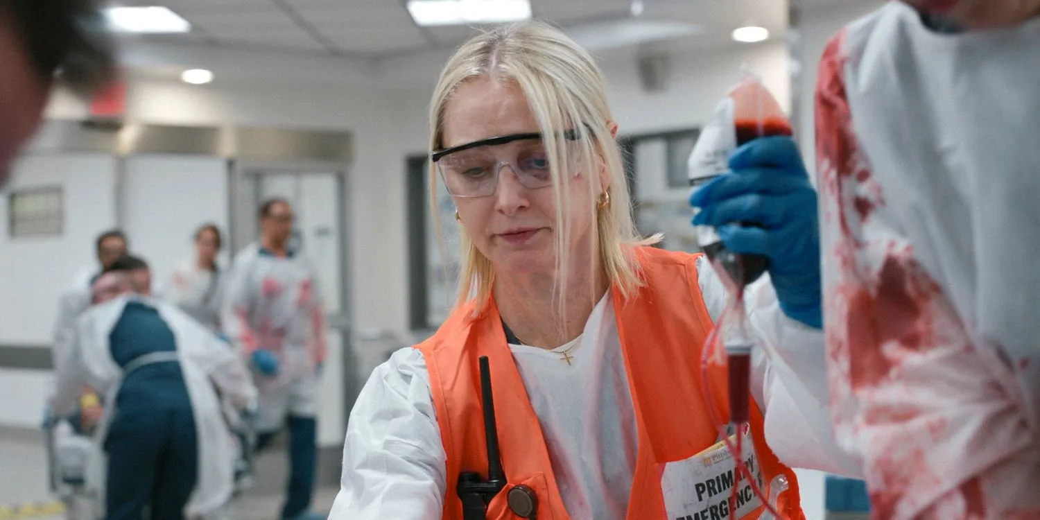 Dana Evans (Katherine LaNasa) giving blood to a patient in The Pitt Season 1 Ep 13